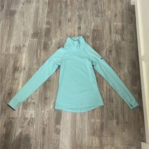 Blue Nike Asymmetrical Quarter Zip.